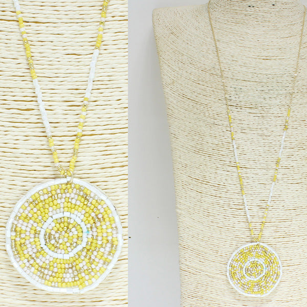 YELLOW ROUND SEED PENDANT NECKLACE